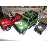 2 Bruder Land rovers and a Solido Willys Jeep