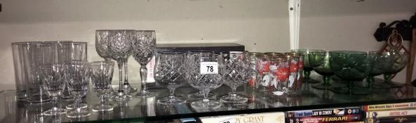 A good selection of glassware including vintage