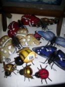 A quantity of metal garden fence ornaments, butterflies, bees etc, plus painted wooden Winnie The