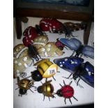 A quantity of metal garden fence ornaments, butterflies, bees etc, plus painted wooden Winnie The