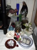 A mixed lot of candle holders, vases etc