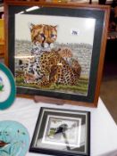 A framed and glazed tapestry of a leopard and a small one of a black cat, 48cm x 48cm and 24cm x