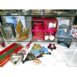 A mixed lot including candles, holders, photo frames, tins, perfume bottle etc