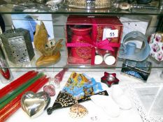 A mixed lot including candles, holders, photo frames, tins, perfume bottle etc