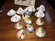 A Queen Anne 14 piece tea set and a Czechoslovakian 10 piece coffee set