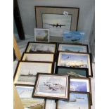 A selection of framed prints and photographs of military ships and planes