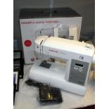 A new boxed Singer Brilliance 6180 sewing machine (only taken out of the box for photos) COLLECT