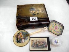 An old lacquered box containing interesting miscellaneous items