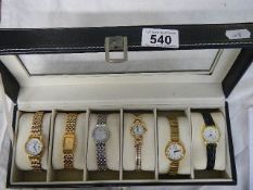 A case of six ladies wrist watches.