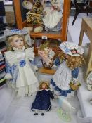 A good lot of collector's dolls.
