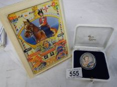 A Coronation calendar and a Queen Elizabeth II brooch.