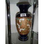 A Royal Doulton vase, a/f (damage under rim)