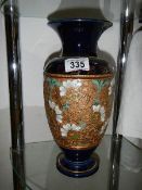 A Royal Doulton vase, a/f (damage under rim)