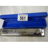 A Hohner harmonica.