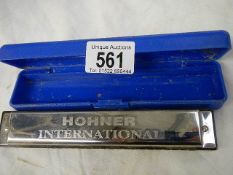 A Hohner harmonica.