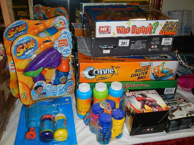 A mixed lot of toys and games including some new. COLLECT ONLY.