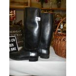 A pair of riding boots.