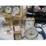 A mixed lot of spring wind and battery mantel clocks.