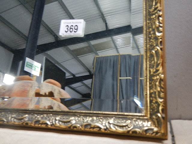 A large gilt framed bevel edged mirror, 82 x 52 cm. COLLECT ONLY. - Image 2 of 2