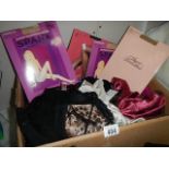 A box of ladies underwear and tights, some new.