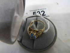 A 9ct gold ring set pale blue stone, size N, 3.1 grams (scratches to stone).