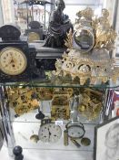 A good lot of clock parts including movements, cases etc (for spare or repair). COLLECT ONLY.