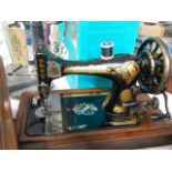 A vintage Singer sewing machine, COLLECT ONLY.