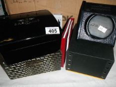 An Orbita battery powered automatic wrist watch winder, 2 Breitling and a Cartier empty boxes.