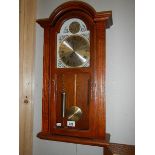 A battery operated wall clock, (needs new battery). COLLECT ONLY.