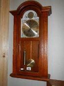 A battery operated wall clock, (needs new battery). COLLECT ONLY.
