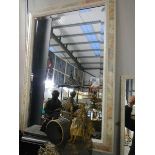 A framed bevel edged mirror, in good condition. COLLECT ONLY.