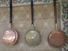Three Victorian copper warming pans. COLLECT ONLY.