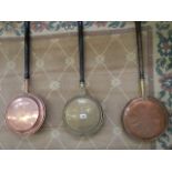 Three Victorian copper warming pans. COLLECT ONLY.