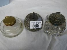 Two glass inkwells and an inkwell in the form of a curling stone.