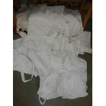 A mixed lot of white linen including two Victorian petticoats.