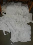 A mixed lot of white linen including two Victorian petticoats.