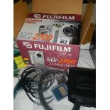 A boxed Fuji Film HX2700 camera.