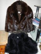 A sequined top from Jigsaw, a faux fur jacket and one other.