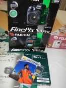 A boxed Fuji Film Fine Pix 53 pro camera.