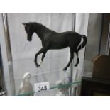 A Royal Doulton black horse.