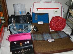 A mixed lot of ladies bags and purses including Harris Tweed, Lacoste, Harley Davidson etc.,
