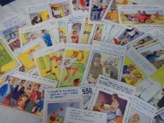 A quantity of humorous postcards.