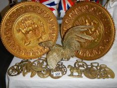 A mixed lot of old brass ware including 2 plaques, cockerel, horse brasses etc.,