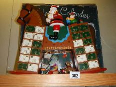 A boxed rocking horse advent calendar.