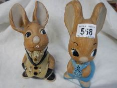 Two large Pendelfin rabbits.