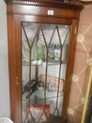 A mahogany astragal glazed corner cabinet. COLLECT ONLY.
