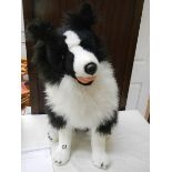 A toy Border Collie dog.
