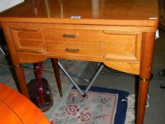 A two drawer side table. COLLECT ONLY.
