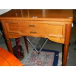 A two drawer side table. COLLECT ONLY.