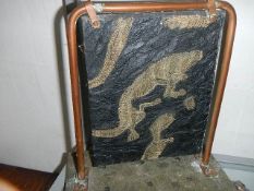 A fossilised slate panel.